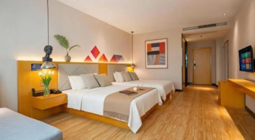 Bed in Borrman Hotel Dongguan Zhongtang