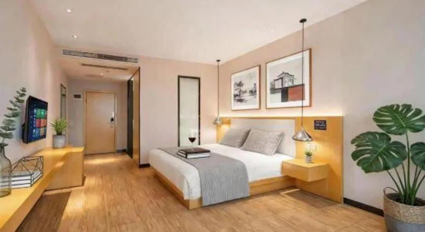 Bed in Borrman Hotel Dongguan Zhongtang