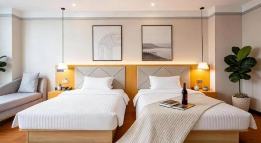 Bed in Borrman Hotel Dongguan Zhongtang