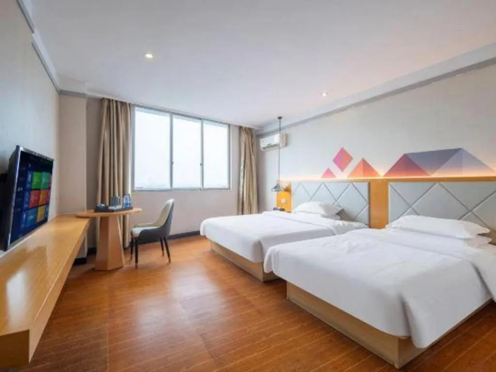 Bed in Borrman Hotel Dongguan Zhongtang