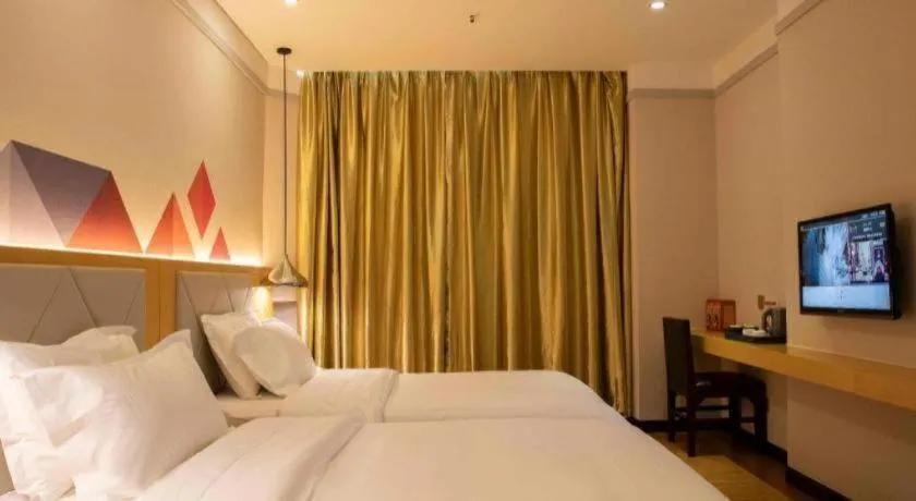 Bed in Borrman Hotel Dongguan Zhongtang