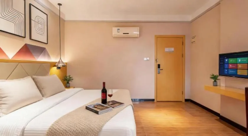 Bed in Borrman Hotel Dongguan Zhongtang