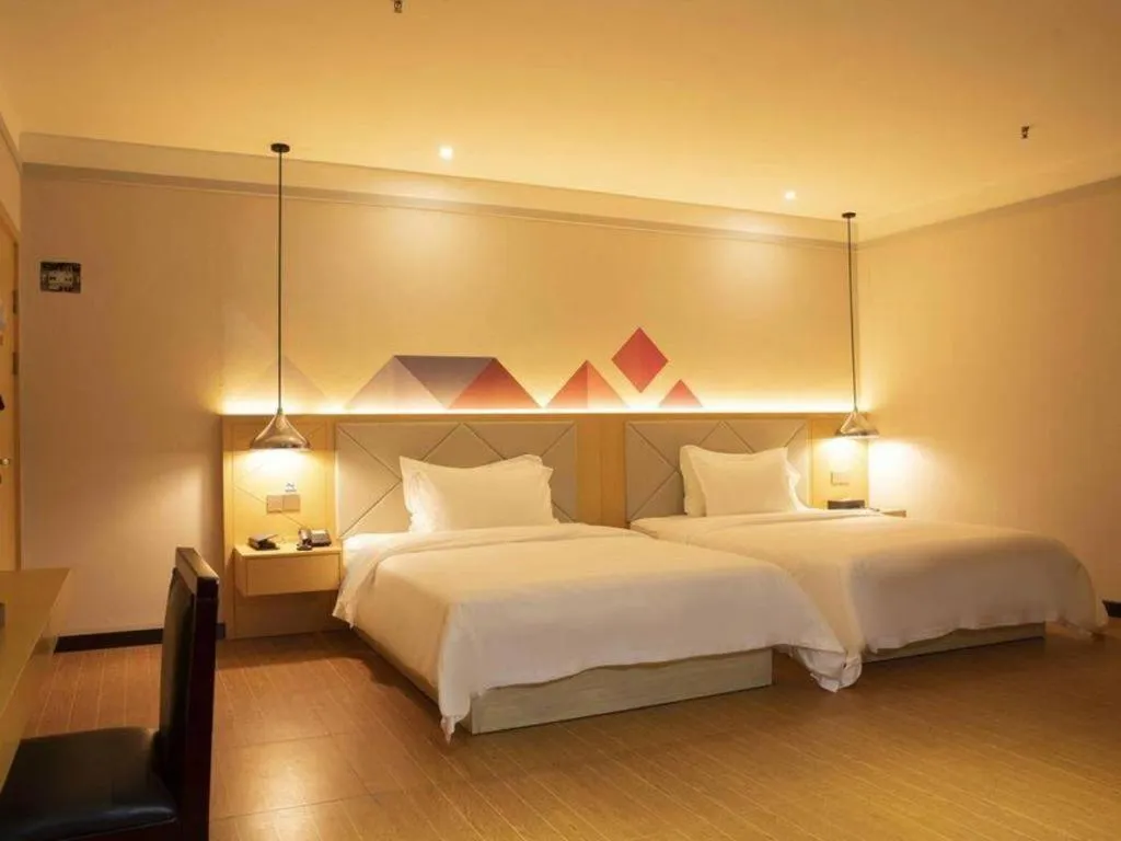 Bed in Borrman Hotel Dongguan Zhongtang