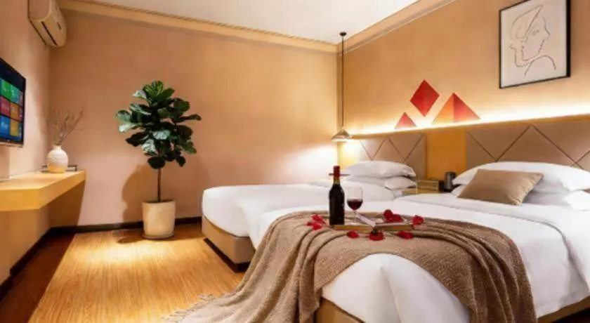 Bed in Borrman Hotel Dongguan Zhongtang