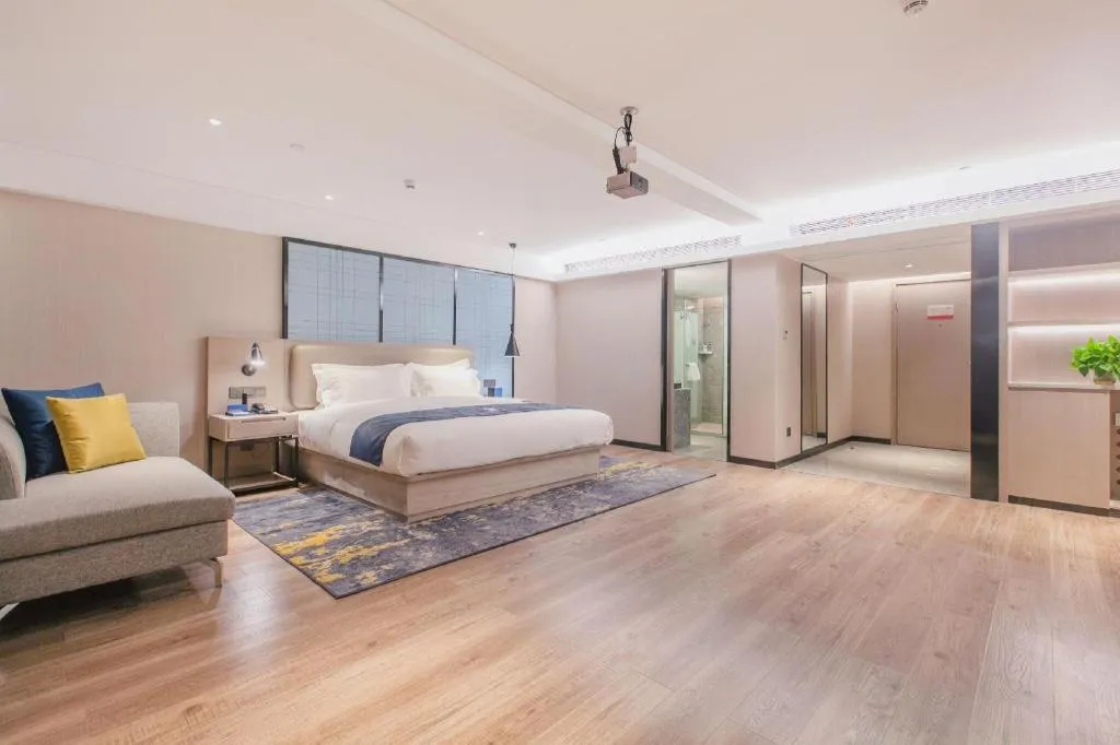 Bed in Echarm Hotel Wuhan Huangpi Xiangyang Avenue