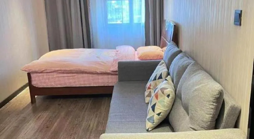 Bed in Echarm Hotel Wuhan Huangpi Xiangyang Avenue