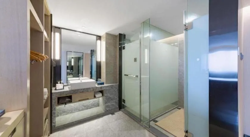 Bed in Echarm Hotel Wuhan Huangpi Xiangyang Avenue