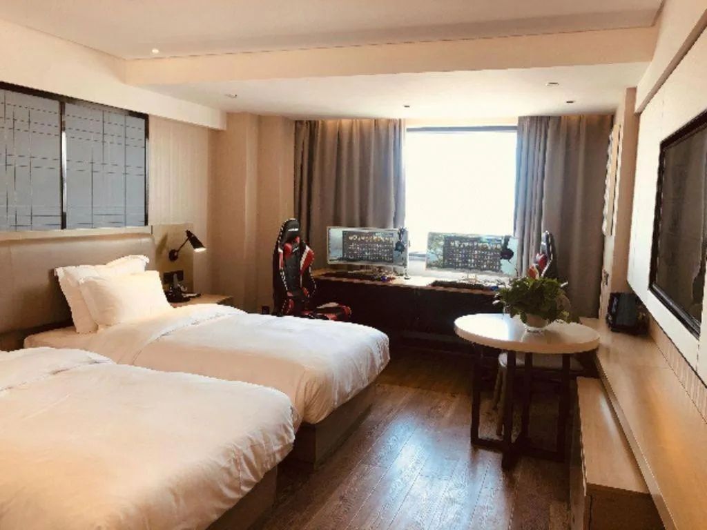 Bed in Echarm Hotel Wuhan Huangpi Xiangyang Avenue