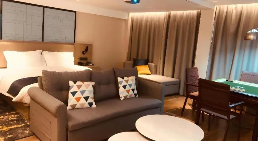 Bed in Echarm Hotel Wuhan Huangpi Xiangyang Avenue