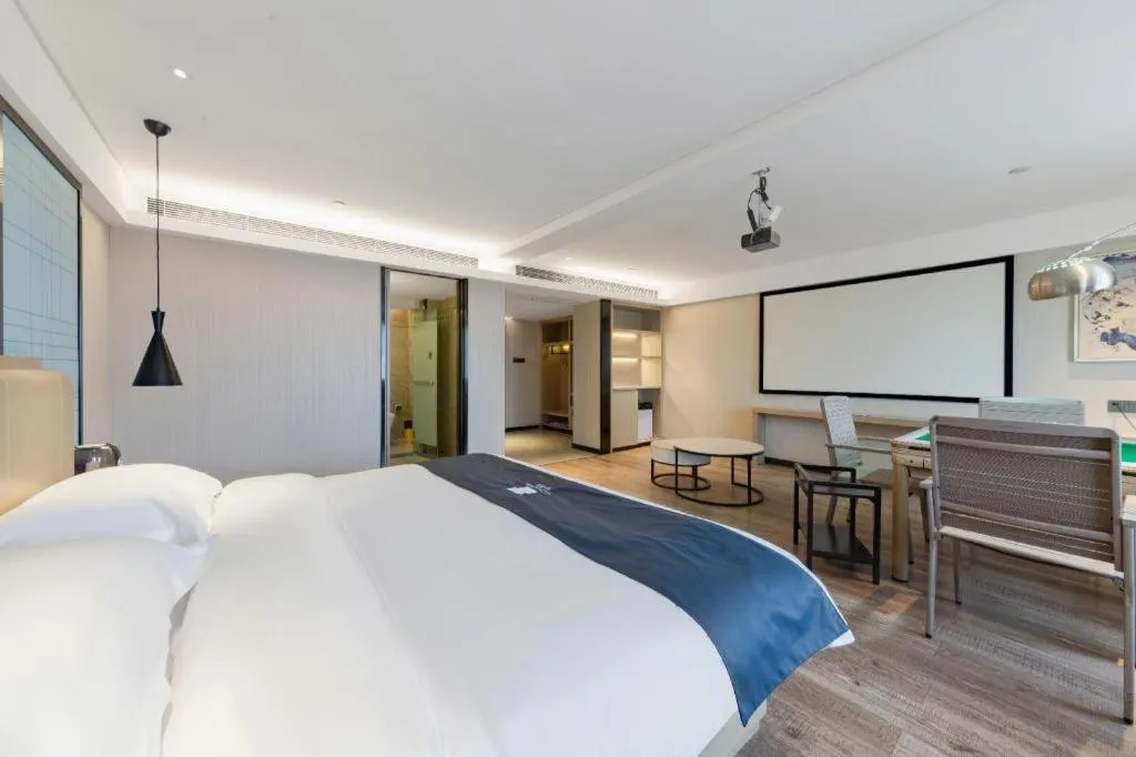 Bed in Echarm Hotel Wuhan Huangpi Xiangyang Avenue