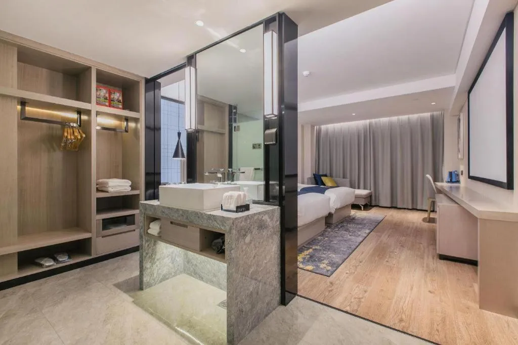 Bed in Echarm Hotel Wuhan Huangpi Xiangyang Avenue