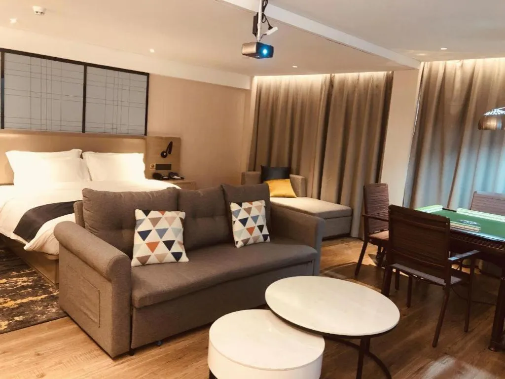 Bed in Echarm Hotel Wuhan Huangpi Xiangyang Avenue