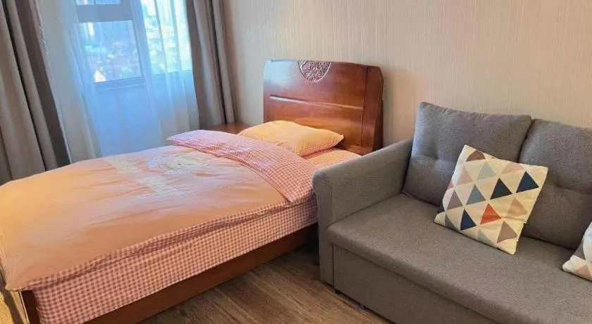 Bed in Echarm Hotel Wuhan Huangpi Xiangyang Avenue