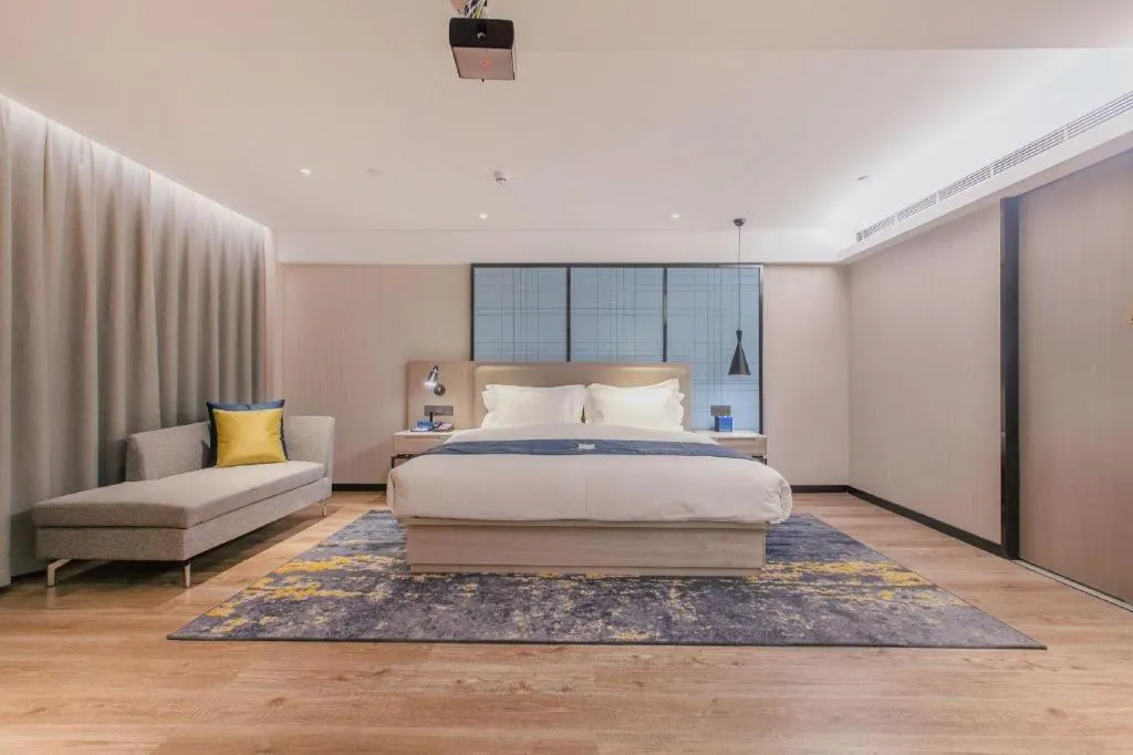 Bed in Echarm Hotel Wuhan Huangpi Xiangyang Avenue