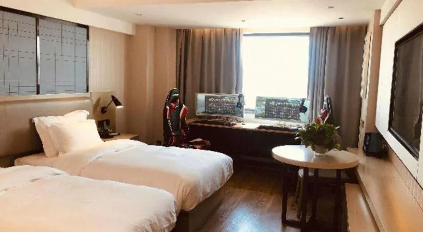 Bed in Echarm Hotel Wuhan Huangpi Xiangyang Avenue