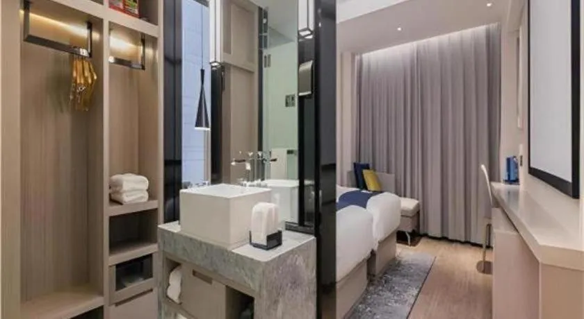 Bed in Echarm Hotel Wuhan Huangpi Xiangyang Avenue