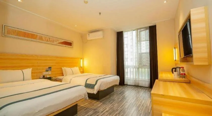 Bed in City Comfort Inn Wuhan Qingshan Jianshi Qingyiju Metro Station