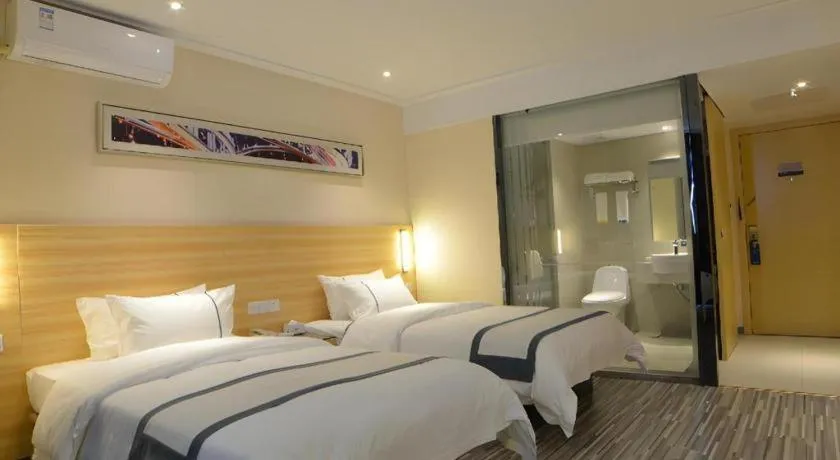 Bed in City Comfort Inn Wuhan Qingshan Jianshi Qingyiju Metro Station