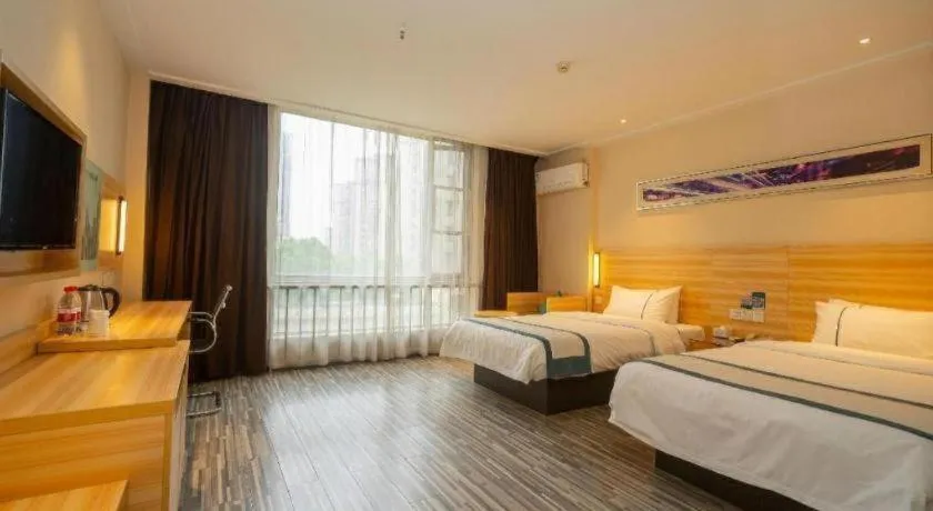 Bed in City Comfort Inn Wuhan Qingshan Jianshi Qingyiju Metro Station