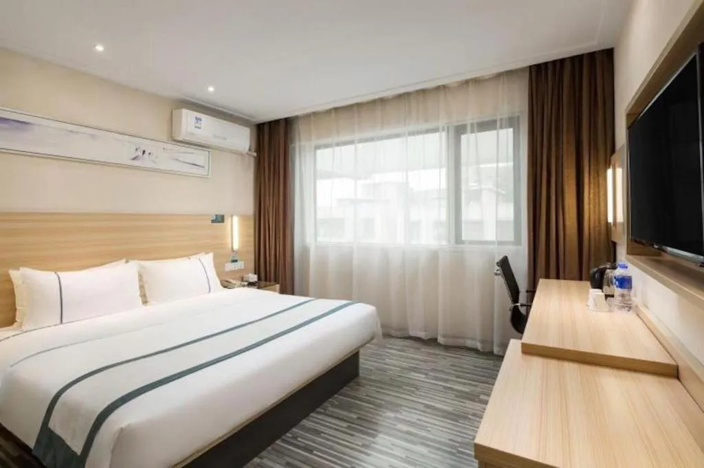 Bed in City Comfort Inn Hengyang Shigu Shuyuan