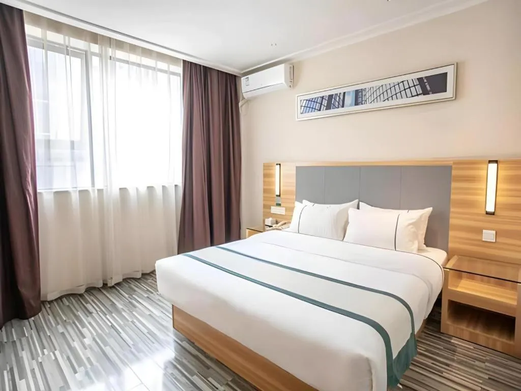 Bed in City Comfort Inn Hengyang Shigu Shuyuan