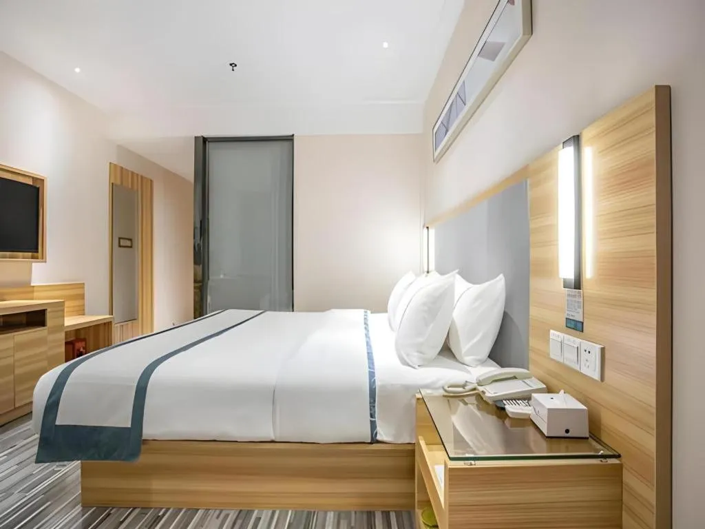 Bed in City Comfort Inn Hengyang Shigu Shuyuan