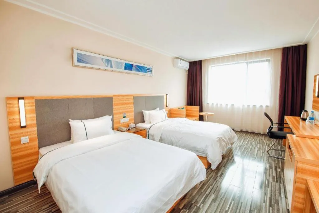 Bed in City Comfort Inn Hengyang Shigu Shuyuan