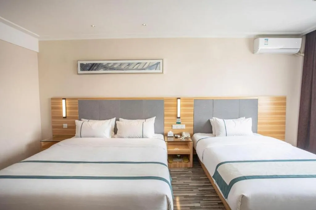 Bed in City Comfort Inn Hengyang Shigu Shuyuan