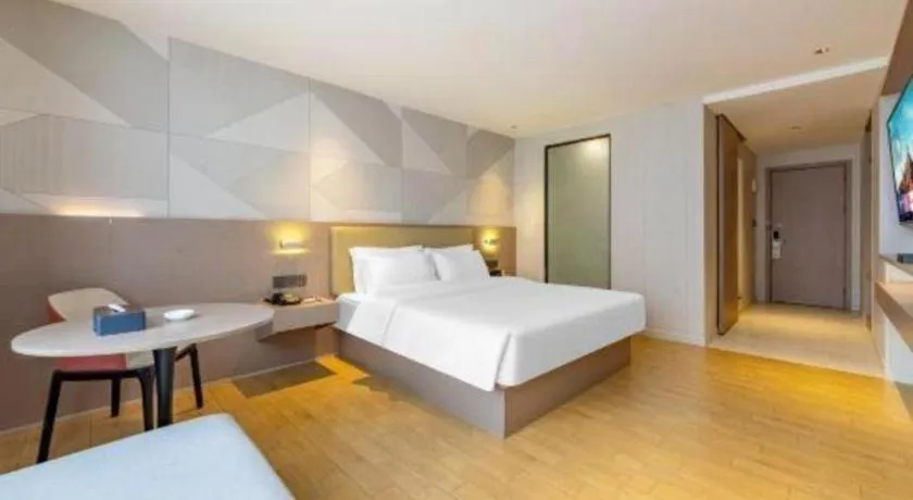 Bed in Borrman Hotel Shaoguan Century East Street Fengcai Building