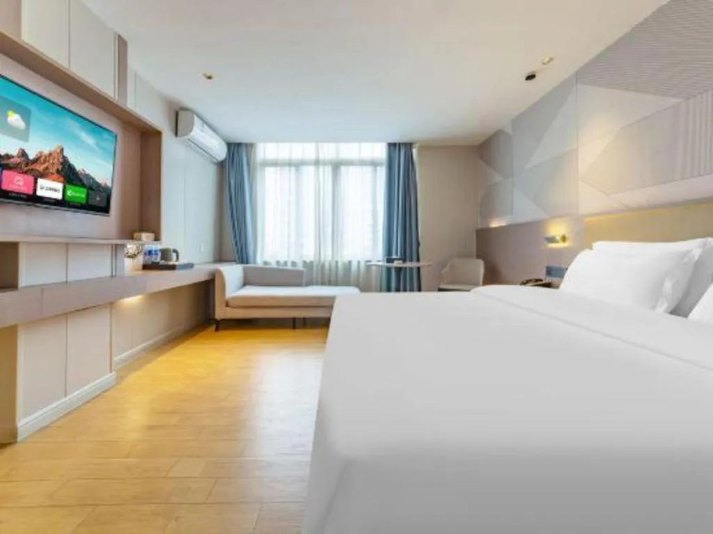 Bed in Borrman Hotel Shaoguan Century East Street Fengcai Building