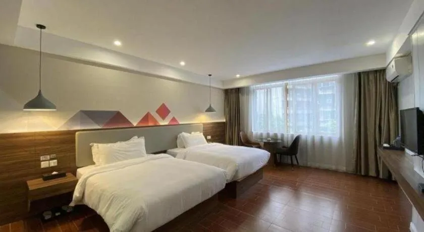Bed in Borrman Hotel Shaoguan Century East Street Fengcai Building
