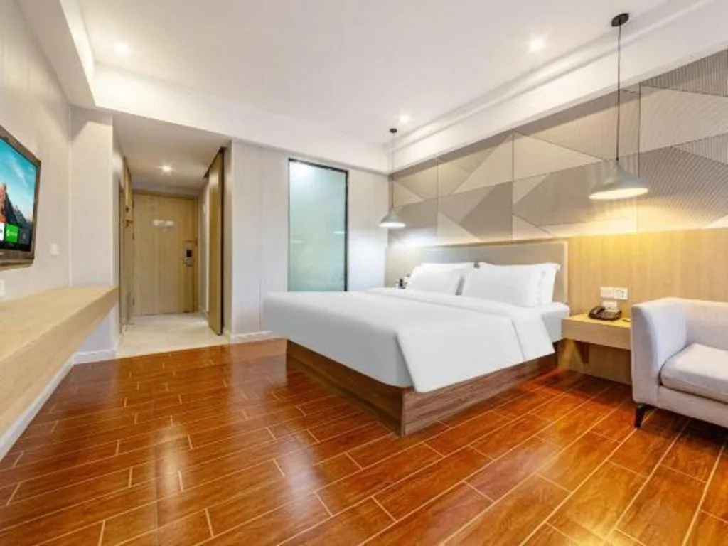 Bed in Borrman Hotel Shaoguan Century East Street Fengcai Building