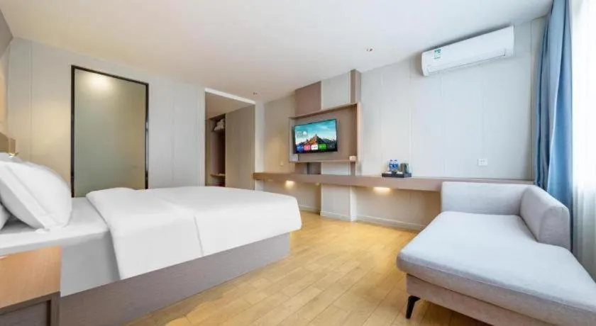 Bed in Borrman Hotel Shaoguan Century East Street Fengcai Building