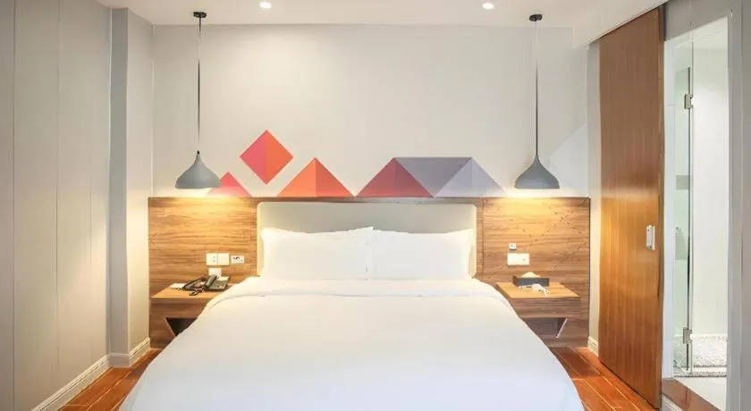 Bed in Borrman Hotel Shaoguan Century East Street Fengcai Building