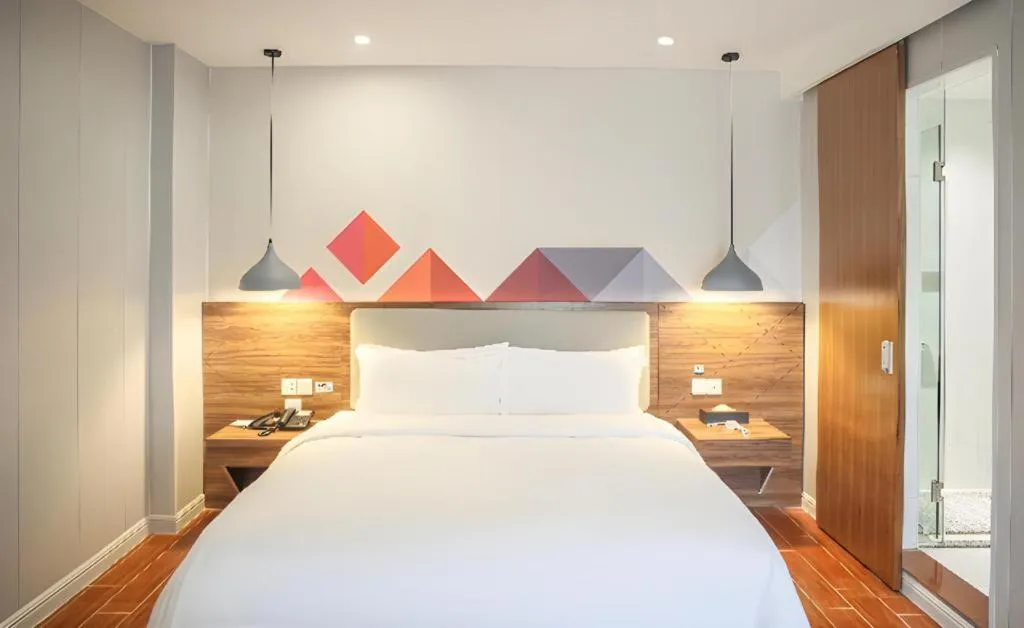 Bed in Borrman Hotel Shaoguan Century East Street Fengcai Building