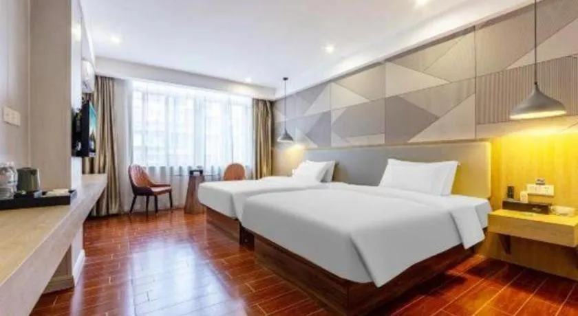 Bed in Borrman Hotel Shaoguan Century East Street Fengcai Building