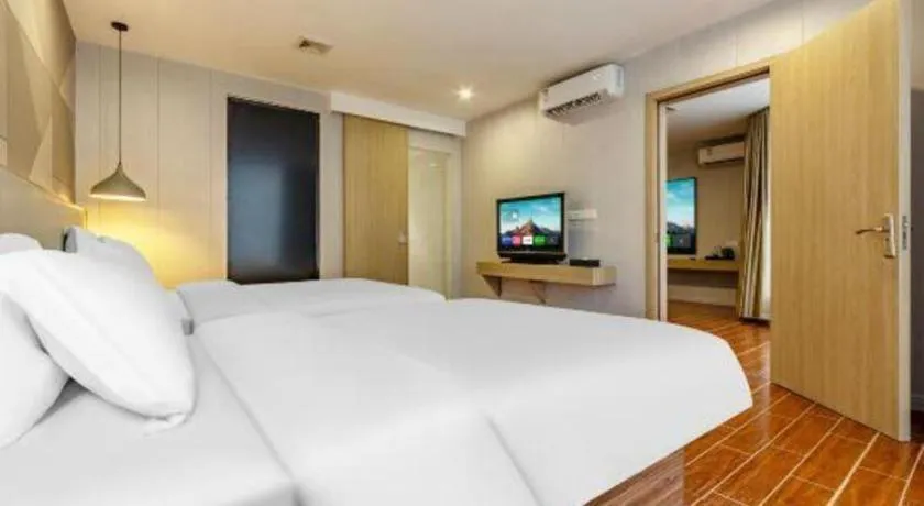 Bed in Borrman Hotel Shaoguan Century East Street Fengcai Building