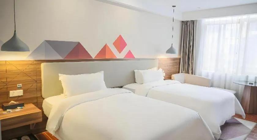 Bed in Borrman Hotel Shaoguan Century East Street Fengcai Building