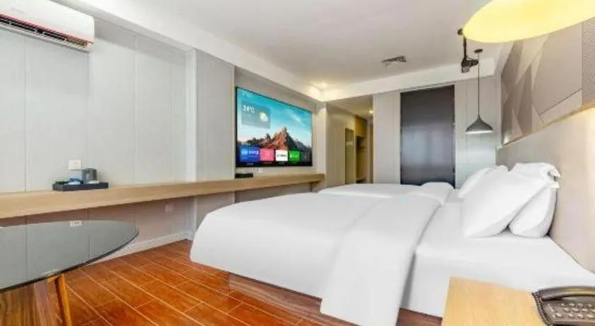 Bed in Borrman Hotel Shaoguan Century East Street Fengcai Building