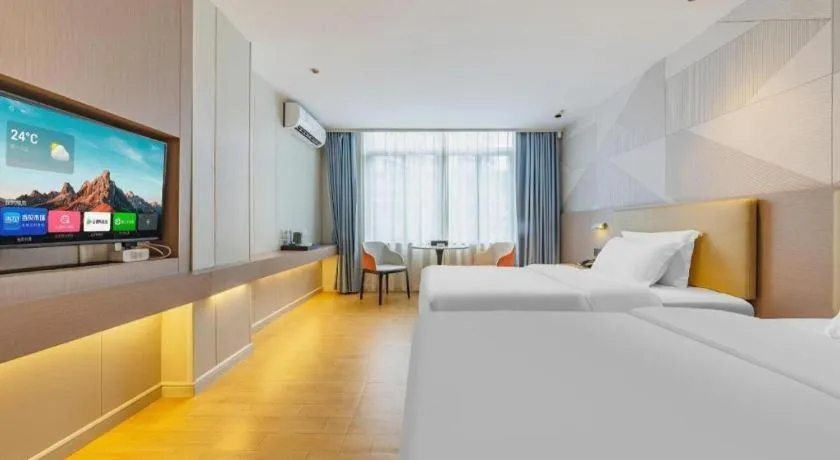 Bed in Borrman Hotel Shaoguan Century East Street Fengcai Building