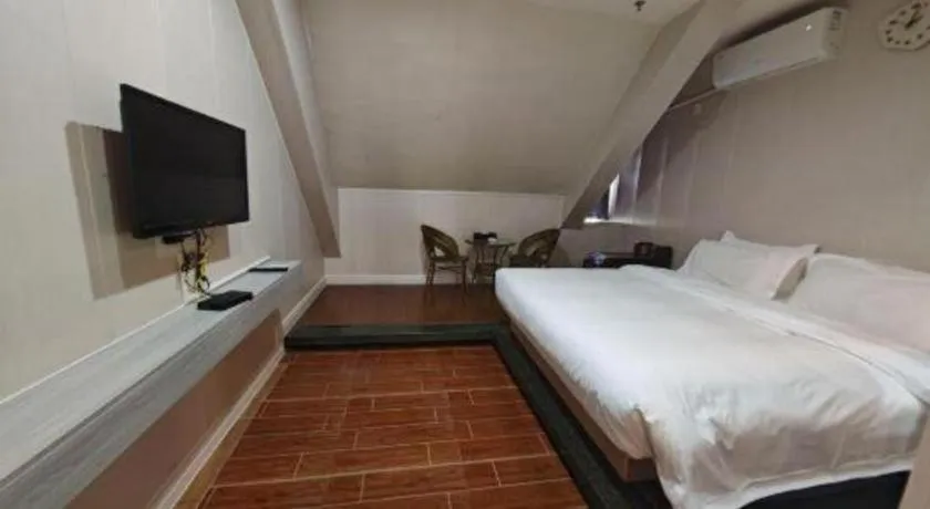 Bed in Borrman Hotel Shaoguan Century East Street Fengcai Building