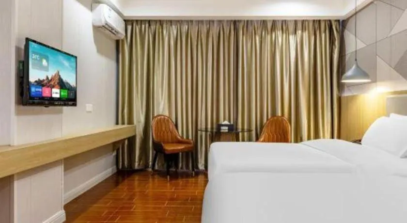 Bed in Borrman Hotel Shaoguan Century East Street Fengcai Building