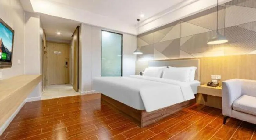Bed in Borrman Hotel Shaoguan Century East Street Fengcai Building