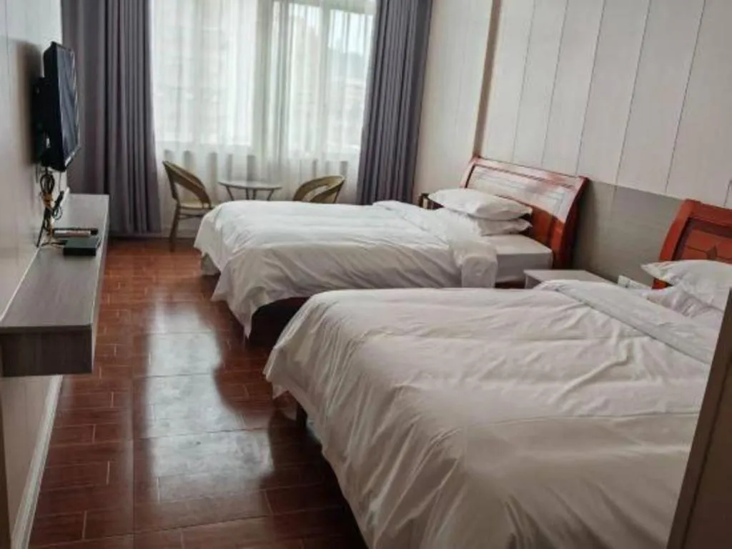 Bed in Borrman Hotel Shaoguan Century East Street Fengcai Building