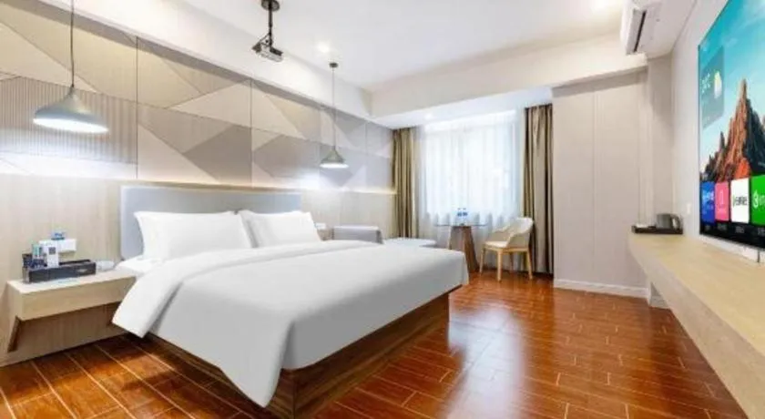 Bed in Borrman Hotel Shaoguan Century East Street Fengcai Building