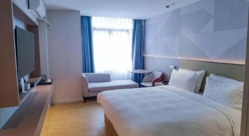Bed in Borrman Hotel Shaoguan Century East Street Fengcai Building
