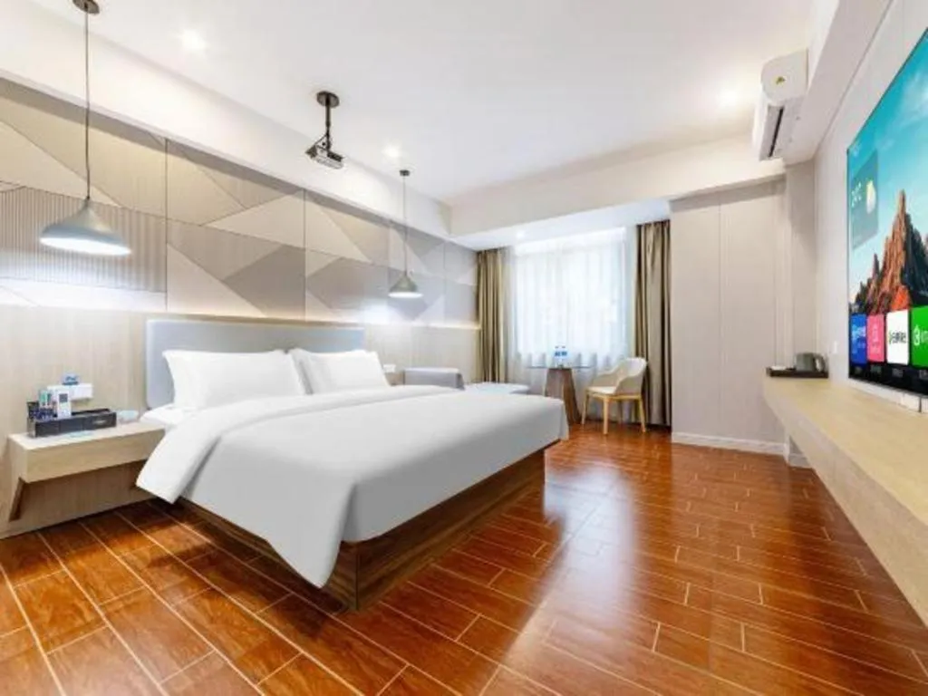 Bed in Borrman Hotel Shaoguan Century East Street Fengcai Building