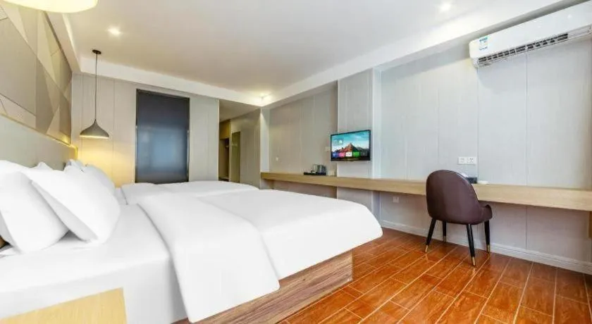 Bed in Borrman Hotel Shaoguan Century East Street Fengcai Building