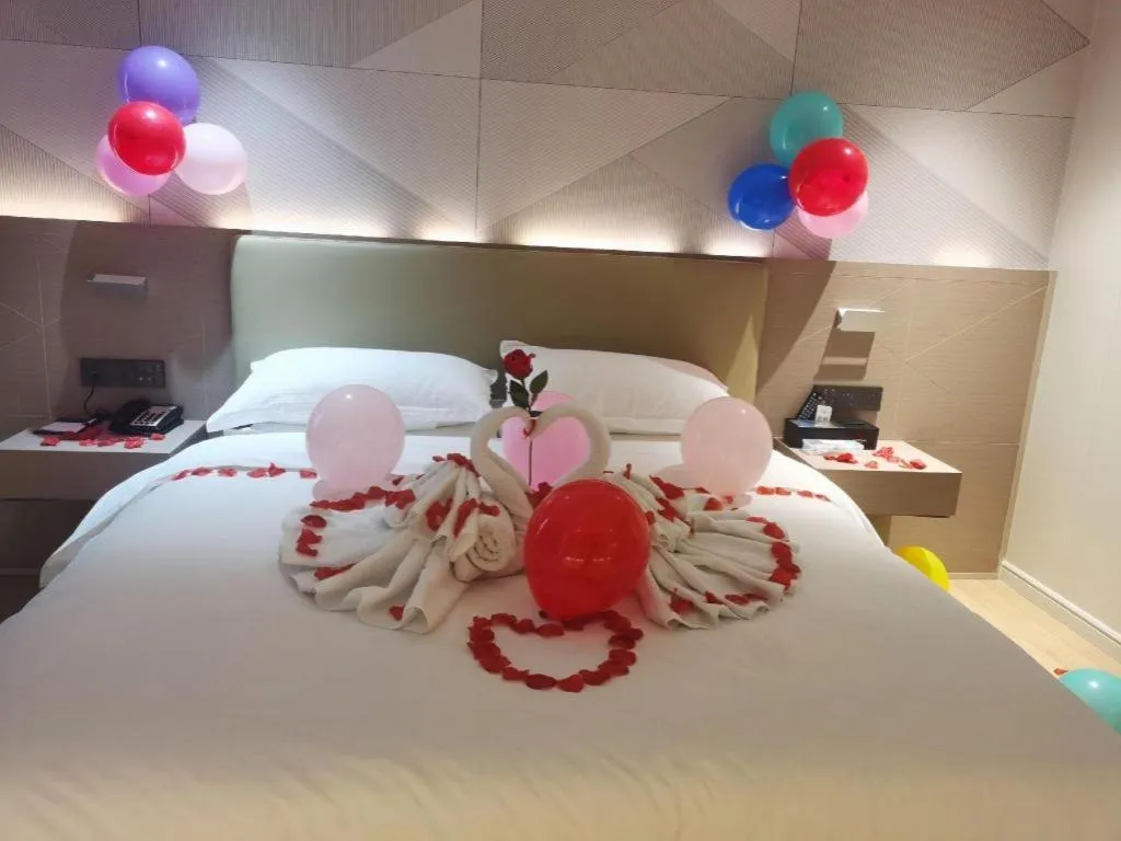 Bed in Borrman Hotel Shaoguan Century East Street Fengcai Building