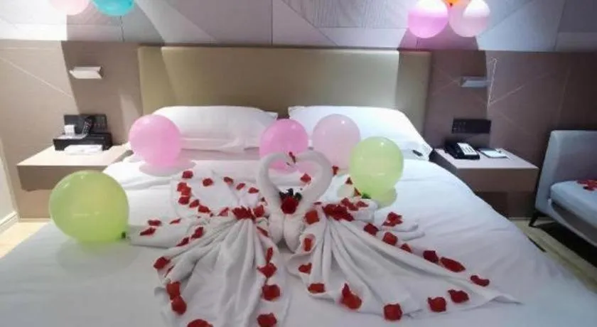 Bed in Borrman Hotel Shaoguan Century East Street Fengcai Building